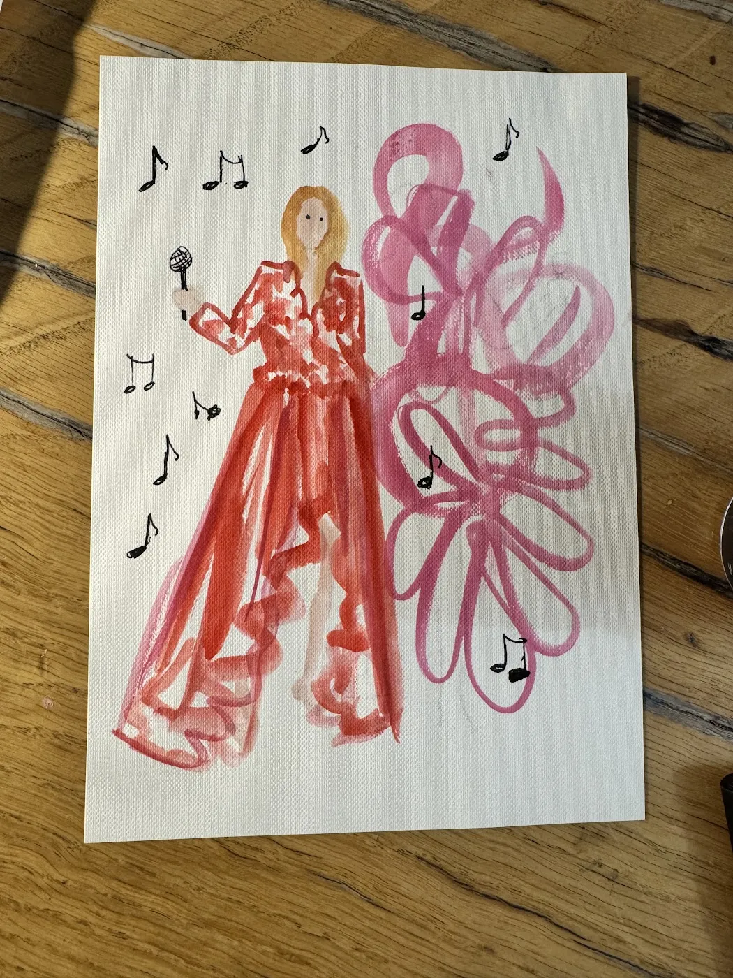 Akwarelowa ilustracja kobiety w czerwonym kombinezonie z nutami i wstęgami