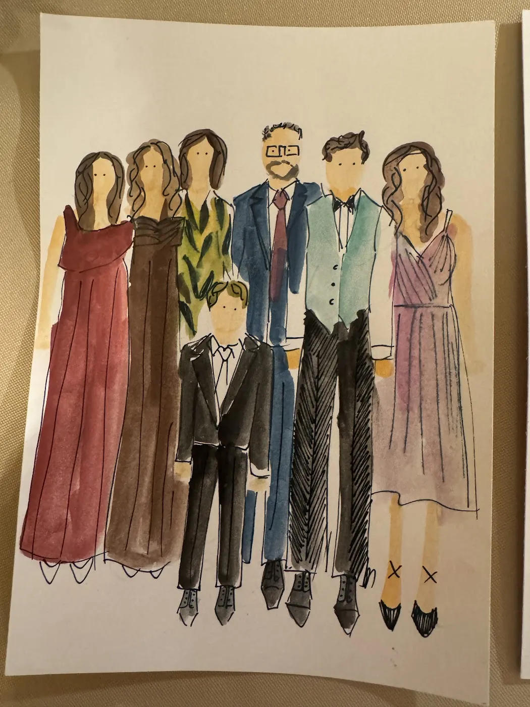 Akwarelowa ilustracja całej rodziny w eleganckich strojach weselnych