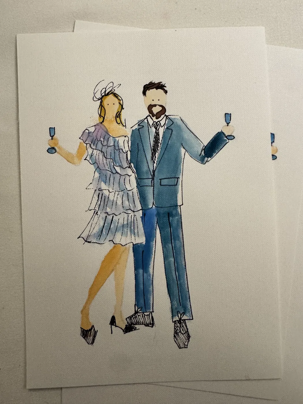 Akwarelowa ilustracja pary gości w błękitnych strojach z kieliszkami
